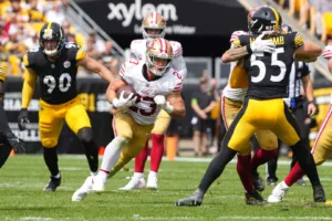 Christian McCaffery (23) had 151 yards rushing and a touchdown in the San Francisco 49ers' 30-7 win at Pittsburgh on Sunday (Photo courtesy of USATODAY.com).