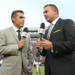 Chris Fowler (left) and Kirk Herbstreit, considered ESPN-ABC's number one college football announce team, won't be calling Colorado-Oregon this Saturday. Instead, they've been assigned to LSU-Arkansas. It could be the duties that both men have taken on that have impacted ESPN's decision. (Photo courtesy of FOOTBALLSCOOP.COM)