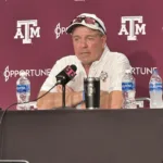 Texas A&M coach Jimbo Fisher (above) addresses the media after the Aggies' win last week over Auburn. A&M faces Arkansas today in an SEC West Division game at AT&T Stadium in Arlington, Texas. (Photo by MITCHELL MOLANDES)