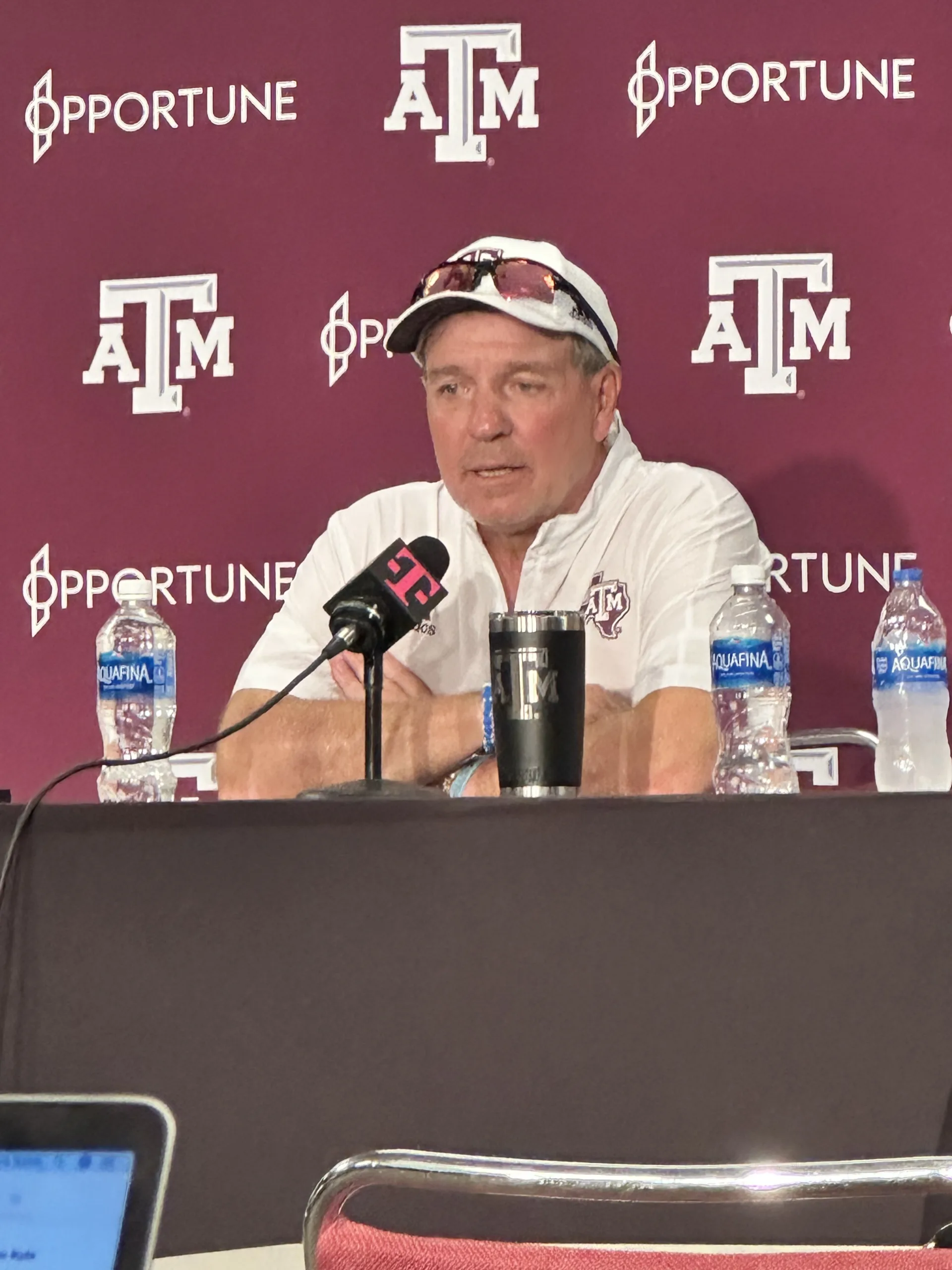 Texas A&M coach Jimbo Fisher (above) addresses the media after the Aggies' win last week over Auburn. A&M faces Arkansas today in an SEC West Division game at AT&T Stadium in Arlington, Texas. (Photo by MITCHELL MOLANDES)