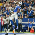 Indianapolis Colts rookie quarterback Anthony Richardson reacts after scoring his first career NFL touchdown on Sunday against the Jacksonville Jaguars. The Jaguars left Lucas Oil Stadium with a 31-21 win, however. (Photo courtesy of JENNA WATSON – THE INDIANAPOLIS STAR)