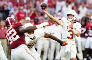 Texas quarterback Quinn Ewers and the Longhorns outperformed Alabama Saturday night in Tuscaloosa, leaving with a 34-24 win. (Photo courtesy of SPORTS.YAHOO.COM)