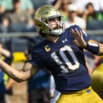 Notre Dame quarterback Sam Hartman (above) threw three touchdown passes in a win over Central Michigan on Saturday. The Fighting Irish host Ohio State this Saturday. (Photo by MICHAEL CATERINA, Courtesy of THE ASSOCIATED PRESS)