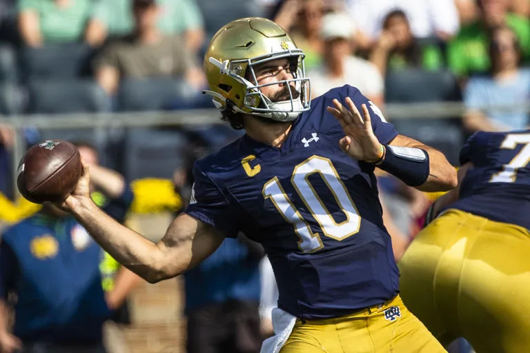 Notre Dame quarterback Sam Hartman (above) threw three touchdown passes in a win over Central Michigan on Saturday. The Fighting Irish host Ohio State this Saturday. (Photo by MICHAEL CATERINA, Courtesy of THE ASSOCIATED PRESS)