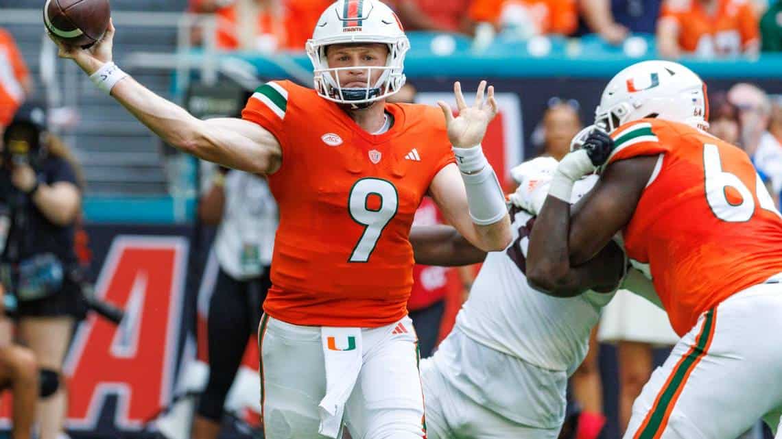 Miami quarterback Tyler Van Dyke (9) threw five touchdown passes in a 48-33 win over Texas A&M on Saturday afternoon. (Photo courtesy of MIAMIHERALD.COM)