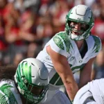 Oregon quarterback Bo Nix leads the Ducks into Washington today for a top-10 showdown. (Photo courtesy of SPORTS ILLUSTRATED)