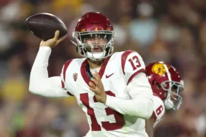 Southern Cal quarterback Caleb Williams (above) threw six touchdowns, an interception, and 403 yards in the Trojans' 48-41 win at Colorado last Saturday. Williams is now the favorite to win the Heisman Trophy, according to FanDuel. (Photo courtesy of NYPOST.COM)