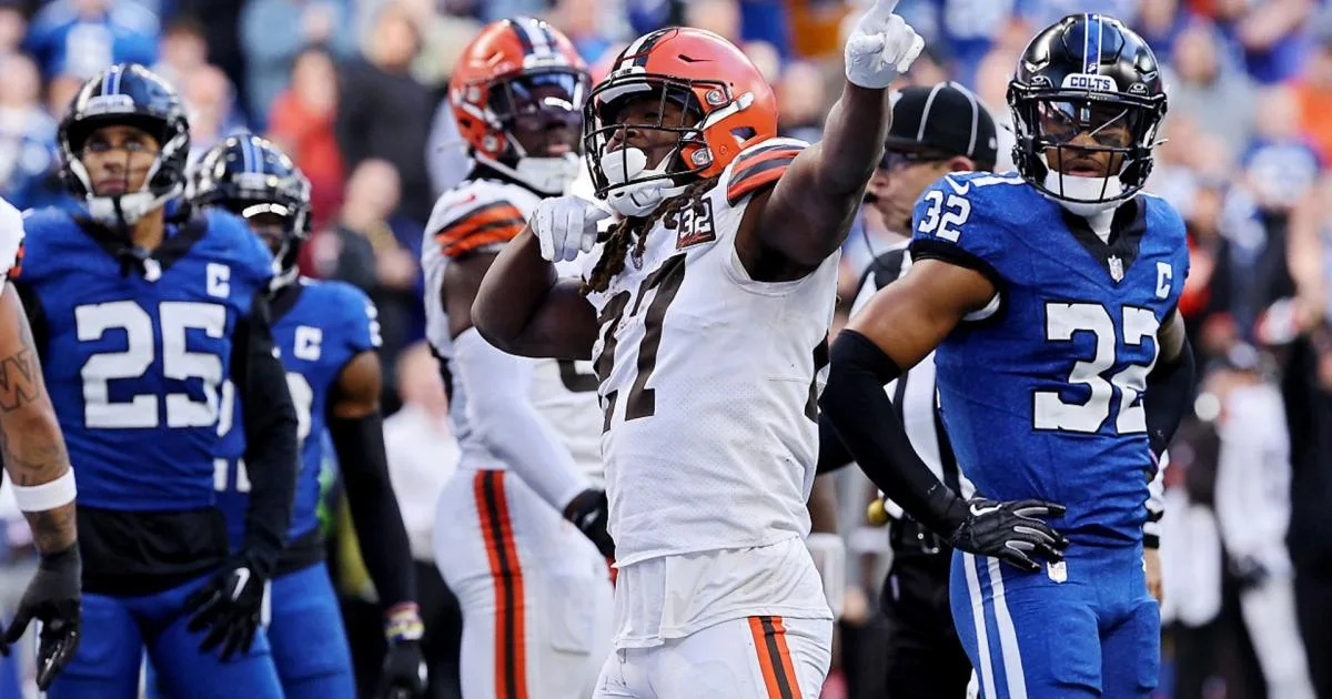 Cleveland running back Kareem Hunt (27) signals for a first down during the Browns' game at Indianapolis on Sunday. Hunt scored the game-winning touchdown later, after two controversial penalties on Colts corner Darrell Baker Jr. (Photo courtesy of SPORTINGNEWS.COM)