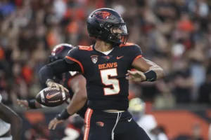 Above: D.J. Uiagalelei, quarterback of the Oregon State Beavers, who take their No. 11 ranking to Arizona on Saturday night. (Photo by AMANDA LOMAN - Courtesy of THE ASSOCIATED PRESS)