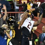 Chicago wide receiver D.J. Moore (right) hauled in eight catches for 230 yards and three touchdowns as the Bears got their first win of the season, a 40-20 win at Washington on Thursday night, just a few hours after the world was informed of the passing of iconic Chicago linebacker Dick Butkus. (Photo courtesy of PM-NEWS.NET)