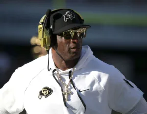 Colorado coach Deion Sanders and his team will face Stanford on Friday night, an 8 p.m. Mountain Time start, but a 9 p.m. Central start and 10, Eastern Time. Sanders let it be known Wednesday he's not happy about late games. (Photo by BRUCE YEONG, courtesy GETTY IMAGES)