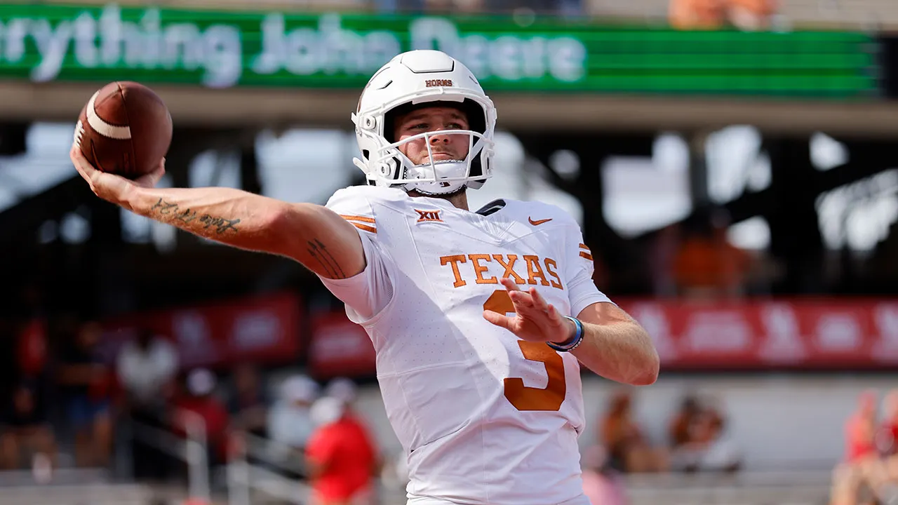 Texas quarterback Quinn Ewers (above) suffered an AC joint injury to his right shoulder, his throwing shoulder, on Saturday in a win over Houston. Ewers is expected to miss some time with the injury; exactly how much is uncertain. The Longhorns, ranked seventh in both the coaches and AP polls, will host BYU Saturday at 2:30 on ABC. (Photo by TIM WARNER - Courtesy of Getty Images)