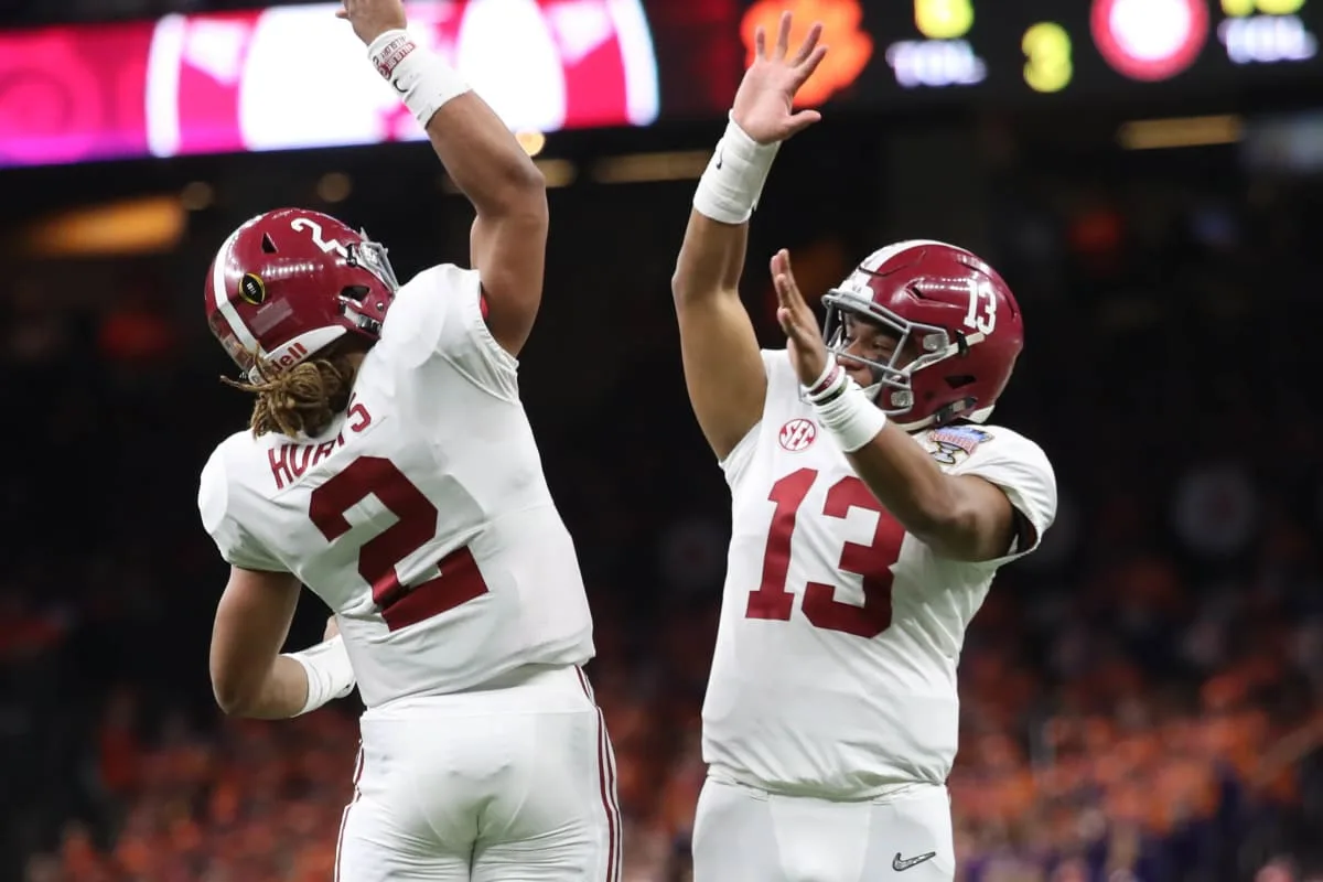 Former Alabama teammates Jalen Hurts (left) and Tua Tagovailoa will face each other Sunday night in Philadelphia, as Hurts leads the Eagles against Tua and the Miami Dolphins. (Photo courtesy of BVMSPORTS.COM)