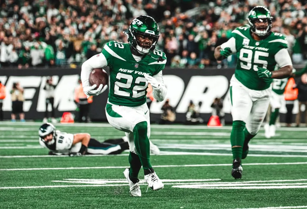 New York Jets corner Tony Smith (22) grabs an interception thrown by Philadelphia quarterback Jalen Hurts late in Sunday's game. The Jets would take the lead right after that, and win the game, 20-14. (Photo courtesy of NEWYORKJETS.COM)