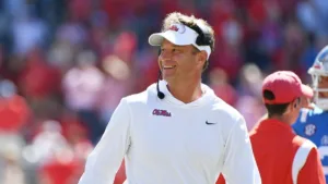 Ole Miss coach Lane Kiffin (above), who's pretty good at trolling people on social media (purposefully and maybe not so much), takes his Rebels to Auburn today for an SEC West Division contest. (Photo courtesy of THEREBELWALK.COM)