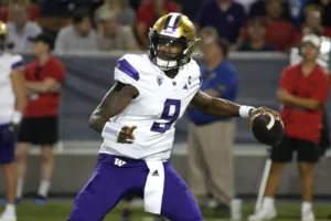 Washington quarterback Michael Penix (above) and the Huskies host Oregon on Saturday in a top-10, Pac-12 showdown. (Photo by RICK SCUTERI, courtesy of THE ASSOCIATED PRESS)