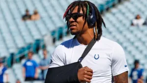 Indianapolis rookie quarterback Anthony Richardson (above) is shown here in a sling during a recent game on the sidelines. The Colts announced Wednesday that Richarson will have surgery on his right (throwing) shoulder and is done for the 2023 season. (Photo courtesy of GAINESVILLE.COM)