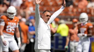 University of Texas coach Steve Sarkisian (above) signals for a touchdown in a recent game. The seventh-ranked Longhorns host BYU today at 2:30 p.m. on ABC. (Photo courtesy of USATODAY.COM)