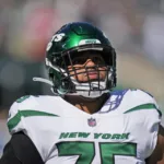 New York Jets right tackle Alijah Vera-Tucker (above) has a torn Achilles tendon and is likely lost for the season, reports say. (Photo courtesy of SPORTS.YAHOO.COM)