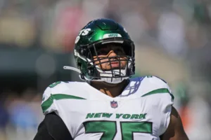 New York Jets right tackle Alijah Vera-Tucker (above) has a torn Achilles tendon and is likely lost for the season, reports say. (Photo courtesy of SPORTS.YAHOO.COM)