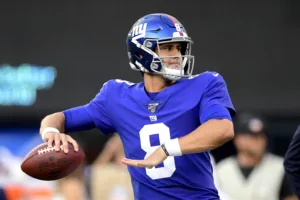 New York Giants starting quarterback Daniel Jones (above) had season-ending surgery on his right knee on Monday, team officials said. The Giants (2-7) visit the Dallas Cowboys this Sunday with an issue at quarterback. (Photo courtesy of YAHOO! SPORTS)