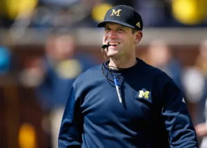 A column on awfulannouncing.com on Thursday says Michigan's entitlement is showing, with its embracing of the anti-hero role in the sign-stealing scandal that's taken lead headlines this season, instead of their wins. Above: Michigan coach Jim Harbaugh. (Photo courtesy of WGRD.COM)