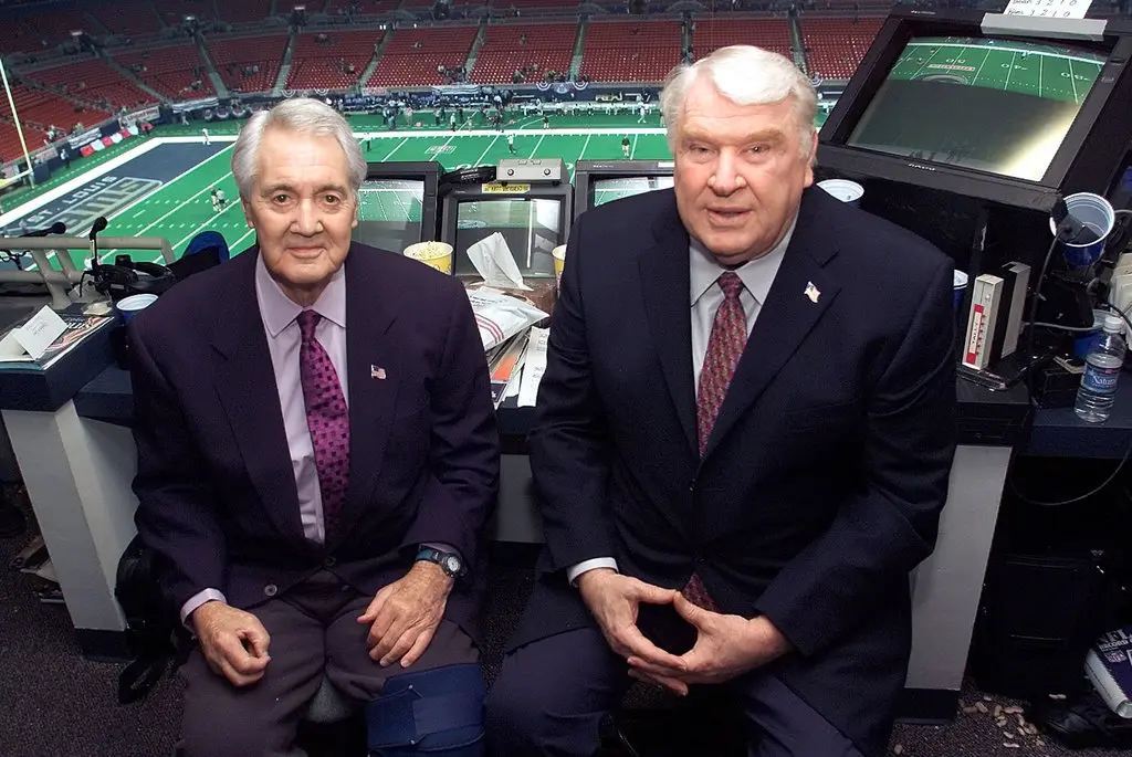 NFL play-by-play man Pat Summerall (left) and his longtime partner, John Madden called many, many games together over the years. Both are gone now. TFB editor / publisher Mitch Lucas says today's Washington-Dallas game recalls the Madden-Summerall Thanksgiving games of the past. (Photo courtesy of THE NEW YORK TIMES)