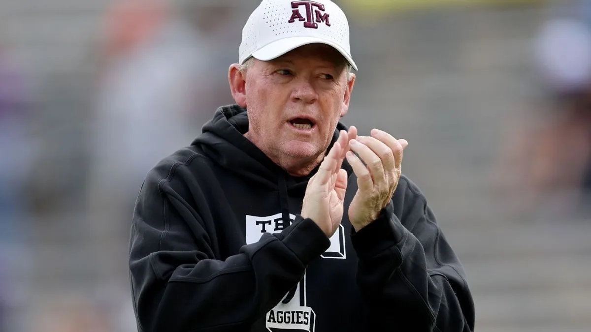 Former Texas A&M offensive coordinator has taken the same position, reports say, at Arkansas, where he once was head coach. (Photo courtesy of MODELCITIZEN.COM)