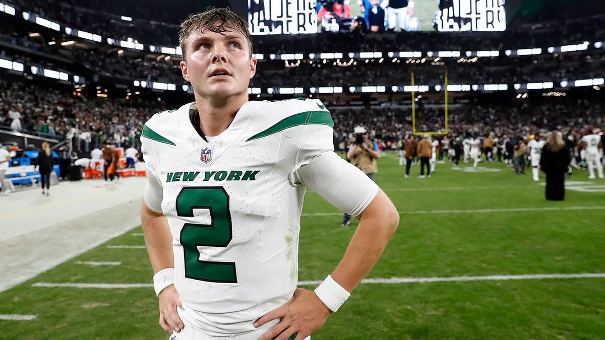 New York Jets starting quarterback Zach Wilson (above) won't be benched, coach Robert Saleh said, in spite of his struggles this season. Wilson took his starting job back when Aaron Rodgers, whom the team traded for this offseason, was injured in the season opener. (Photo courtesy of FOX NEWS)