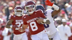 Dillon Gabriel (8) has entered the transfer portal, opting to leave Oklahoma. The Sooners are scheduled to face Arizona in the Valero Alamo Bowl on Dec. 28, but won't have Gabriel or offensive coordinator Jeff Lebby, now the head coach at Mississippi State. (Photo courtesy of NEWSON6.com)