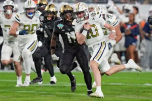 Haynes King (10) ran for a touchdown and threw for one in Georgia Tech's 30-17 win over Central Florida in the Union Home Mortgage Gasparilla Bowl on Friday in Tampa, Fla. (Photo courtesy of THE ASSOCIATED PRESS.)