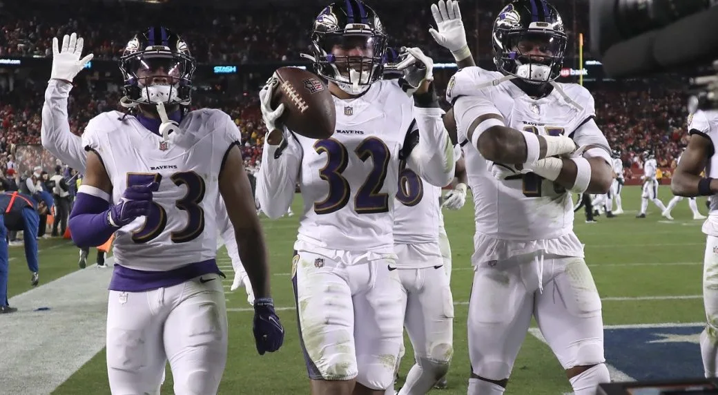 Members of the Baltimore Ravens pose after a San Francisco turnover Monday night. There were plenty of them (five) and the Ravens won, 33-19. (Photo courtesy of BVMSPORTS.COM)