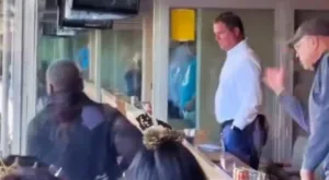 Carolina owner David Tepper appeared to pour his drink out his open-air suite onto Jacksonville fans during Sunday's 26-0 Panthers loss. The Panthers also have to give up their No. 1 pick in April's draft to Chicago, based on a trade last year. (Photo courtesy of TOTALPROSPORTS.COM)