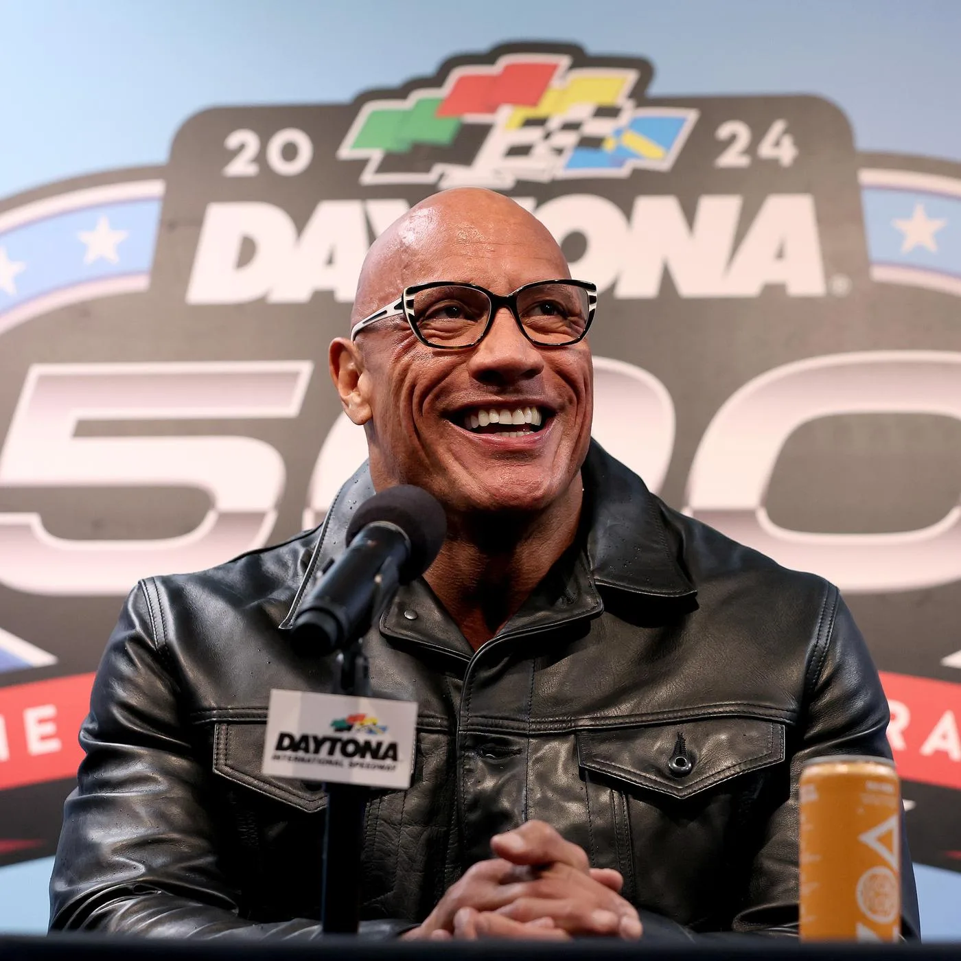 Dwayne "The Rock" Johnson (above) talks at a press event for last weekend's Daytona 500. Johnson is a part of the new United Football League (UFL), a spring football league set to launch March 30 with an excitement seldom seen before. (Photo courtesy of LISTENNOTES.COM)