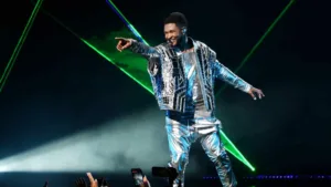 Usher (above) will perform at halftime today in Las Vegas at Super Bowl LVIII. (Photo courtesy of WHATSTRENDING.COM)