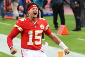 Kansas City quarterback Patrick Mahomes (above) has agreed to restructure his contract to help the team financially this offseason, The Football Beat has learned. (Photo courtesy of HEAVY.COM)