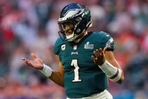Philadelphia quarterback Jalen Hurts shrugs during a game. Perhaps he's also shrugging at the idea of playing the season opener in Brazil; the Eagles will do that on a Friday, Sept. 6, against the Green Bay Packers. (Photo courtesy of MARCA.COM)