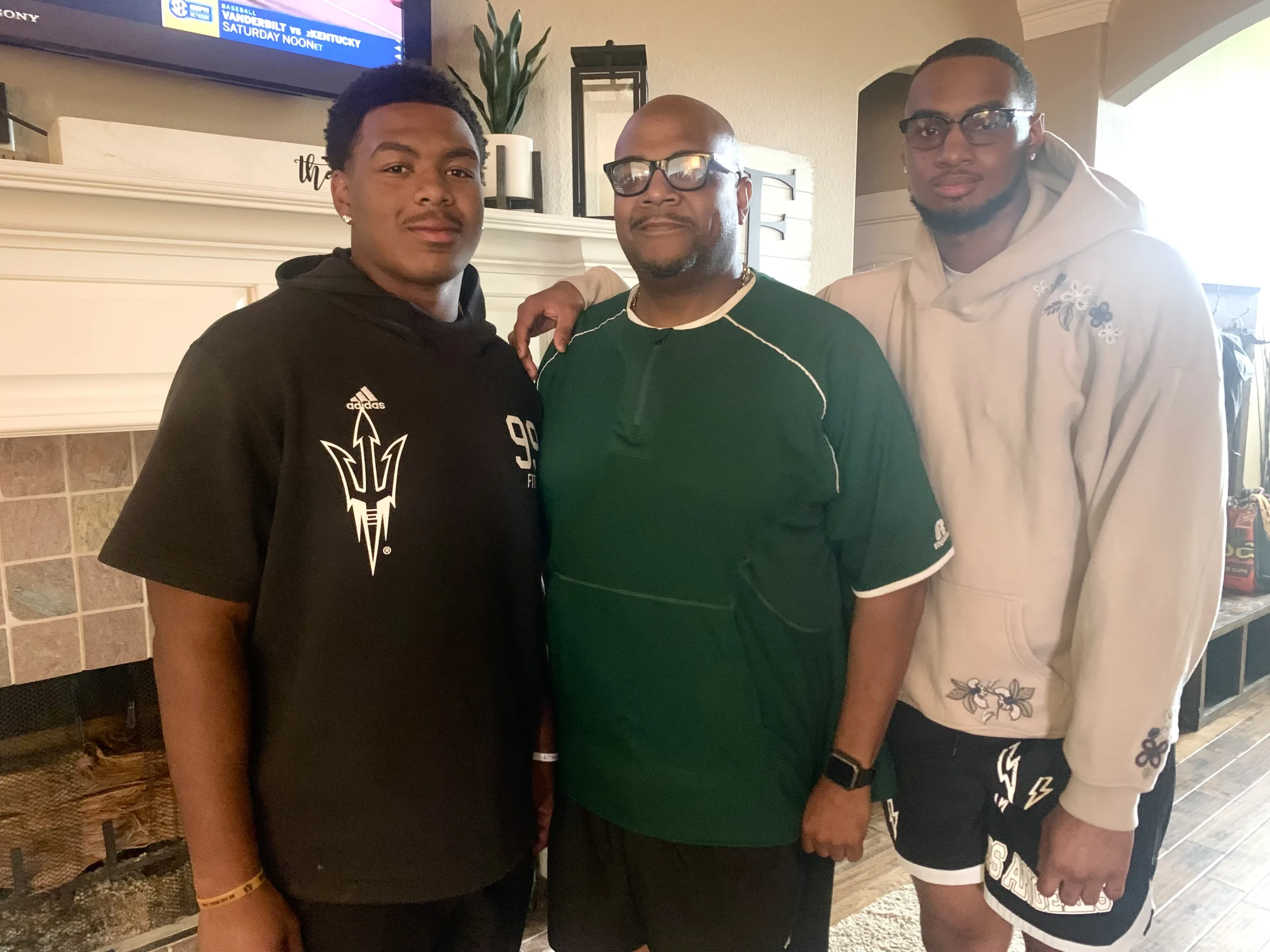 Drenon Fite (center) and his sons, C.J. (left), a defensive lineman at Arizona State, and Trey (right), a linebacker at Louisiana-Lafayette. (Photo by MITCH LUCAS - THEFOOTBALLBEAT.COM)