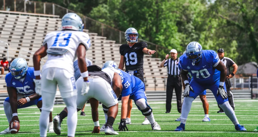 Kilgore (Texas) College quarterback Tyler Webb (center), looking all Peyton Manning-like, calling out plays right before the snap during the Rangers' spring game on Saturday, April 27. (Photo by ALEX NABOR - THEFOOTBALLBEAT.COM)