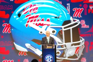 Southeastern Conference Commissioner Greg Sankey (above) introduced every football coach, including Ole Miss coach Lane Kiffin, prior to their opening remarks at SEC Media Days at The Omni in Dallas recently. We at The Football Beat so enjoyed covering the event that we decided you guys might like to see a photo gallery, and provide more details. So, here it is. (Photos largely by VIRGINIA HAGLER-LUCAS - THE FOOTBALL BEAT)