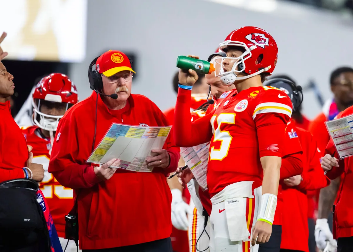 In a complete "total surprise," Kansas City, the NFL's defending Super Bowl champion, is the favorite by DraftKings Sportsbook to finish with most regular season wins this upcoming season, followed closely by San Francisco and Baltimore. Pictured: Chiefs coach Andy Reid (center) and quarterback Patrick Mahomes. (Photo courtesy of ATHLONSPORTS.COM)