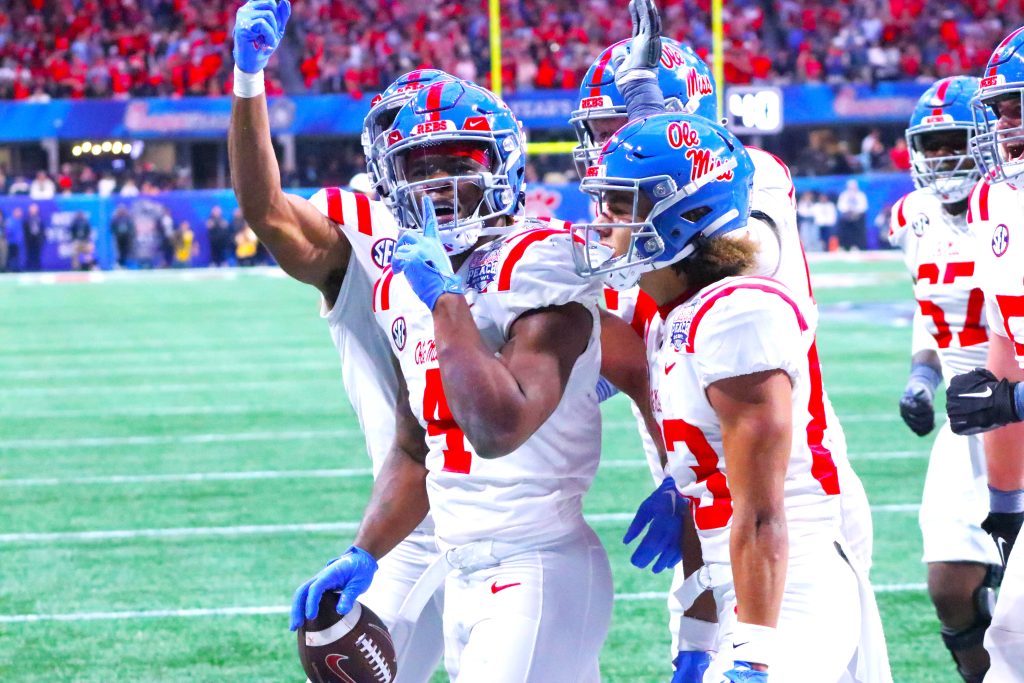 The Ole Miss Rebels (shown here in a Peach Bowl win over Penn State to end the 2023 season) will begin the season in the top 10; four SEC teams are there, now that Texas is in that conference. (Photo by DENNIS JACOBS - THE FOOTBALL BEAT)